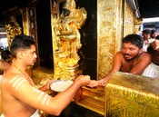 SABARIMALA, JULY 16 (UNI) :- Devotees gathered at Lord Ayyappa temple which opened for five-day poojas in Malayalam month Karkidakam, in Sabarimala on Wednesday. UNI PHOTO - 121U SABARIMALA, JULY 16 (UNI) :- Devotees gathered at Lord Ayyappa temple which opened for five-day poojas in Malayalam month Karkidakam, in Sabarimala on Wednesday. UNI PHOTO - 121U