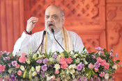 SITAMARHI, AUG 08 (UNI): Union Home Minister Amit Shah addresses a public meeting, in Sitamarhi on Friday. UNI Photo N37U SITAMARHI, AUG 08 (UNI): Union Home Minister Amit Shah addresses a public meeting, in Sitamarhi on Friday. UNI Photo N37U