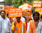 LUCKNOW, 15 JUL (UNI):- Activists of the Sanatan Raksha Sangathan take part in a protest march against Samajwadi Party chief Akhilesh Yadav over his statements regarding the Ayodhya Ram Mandir and alleged theft of donations at the temple, at Hazratganj crossing in Lucknow on Wednesday. UNI PHOTO-7U