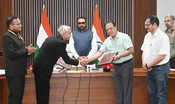 NEW DELHI, 15 JUL (UNI):- Minister of State (Independent Charge) for Ayush and Health and Family Welfare, Prataprao Jadhav witnessing the exchange of the signed Memorandum of Understanding (MoU) between the Ministry of Ayush and the University of Delhi to strengthen collaboration in the fields of Ayurveda, medicinal plants, research and academic exchange, in New Delhi on Wednesday. UNI PHOTO-85U