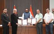 NEW DELHI, 15 JUL (UNI):- Minister of State (Independent Charge) for Ayush and Health and Family Welfare, Prataprao Jadhav witnessing the exchange of the signed Memorandum of Understanding (MoU) between the Ministry of Ayush and the University of Delhi to strengthen collaboration in the fields of Ayurveda, medicinal plants, research and academic exchange, in New Delhi on Wednesday. UNI PHOTO-87U